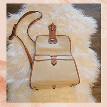 Load image into Gallery viewer, Dooney &amp; Bourke Beige &amp; Brown All Weather Leather Crossbody Handbag (Pre-Loved) Medium
