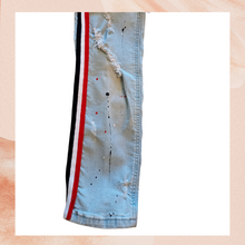 Load image into Gallery viewer, Light Wash Destroyed Paint Splatter Skinny Jeans (Pre-Loved) W34 L32
