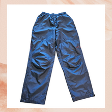 Carica l&#39;immagine nel visualizzatore della galleria, Nike Navy Storm Fit Wind Runner Ankle Zip Pants (Pre-Loved) Medium
